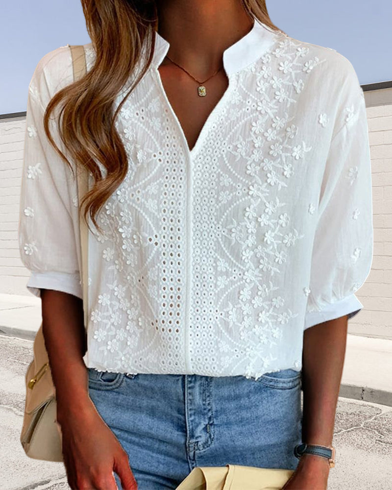 V-neck blouse with puff sleeves and lace trim